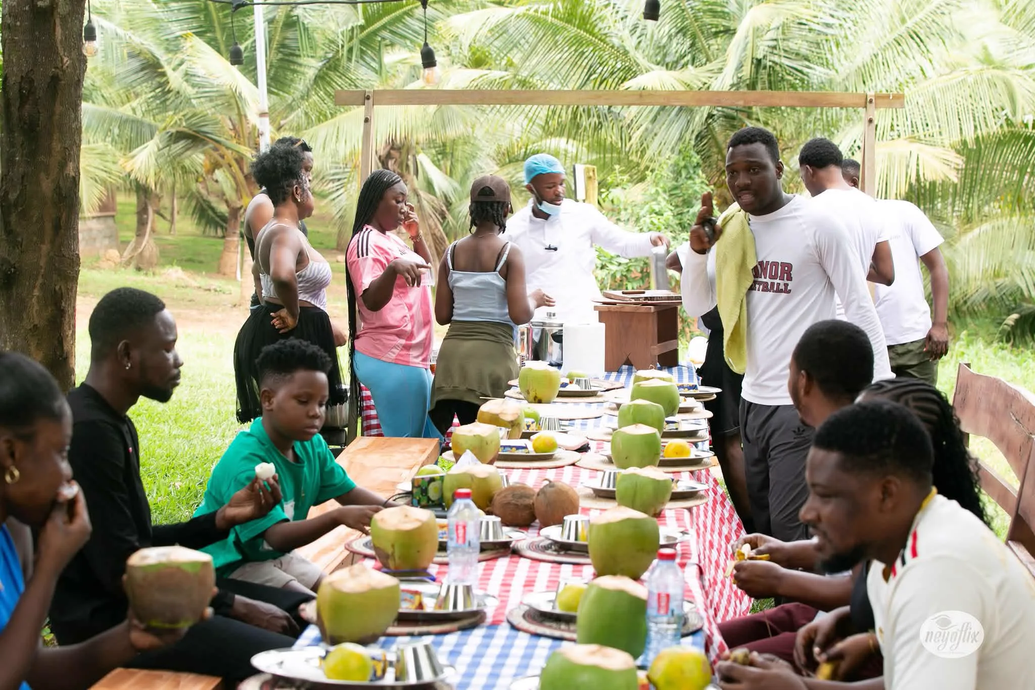 A community table outdoors at Adoko Farms