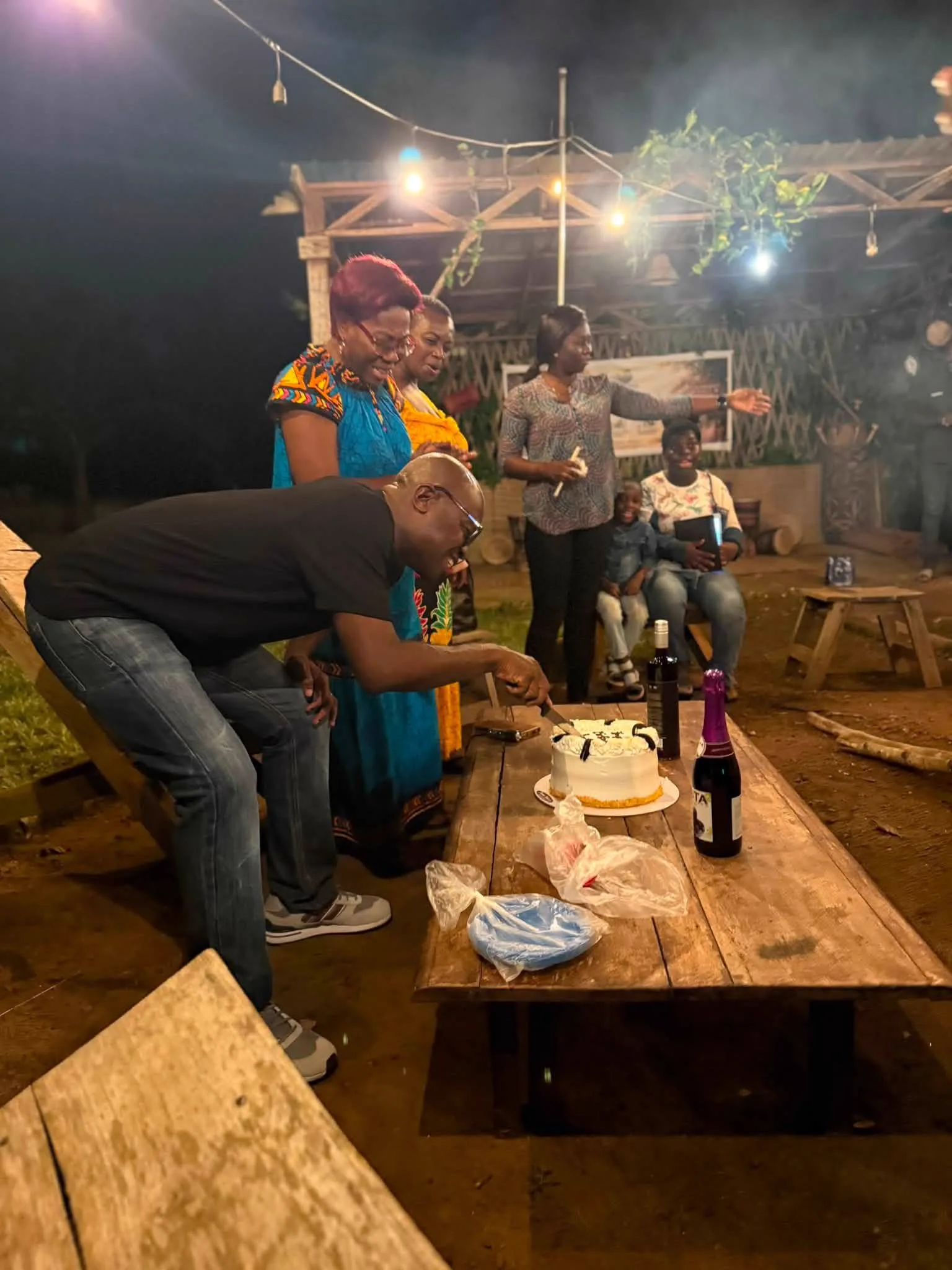 An evening gathering at Adoko Farms