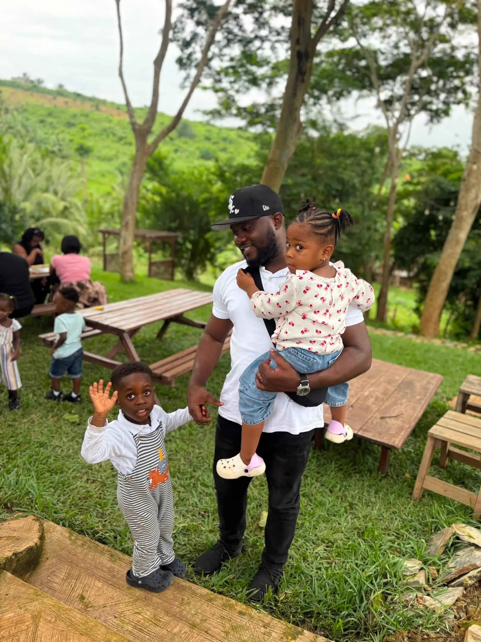 A family spending time outdoors at Adoko Farms